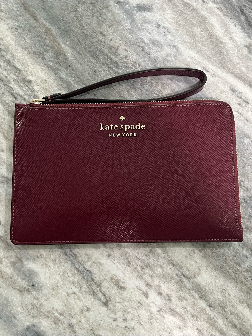 kate spade Burgundy Leather Wristlet with Gold Logo